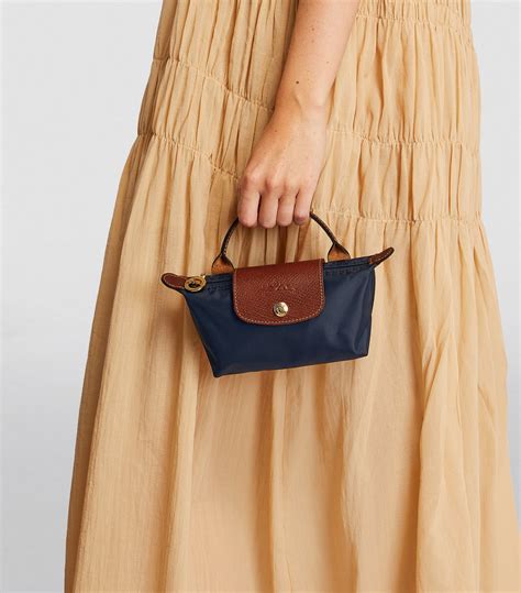 longchamp le pliage mini pouch.